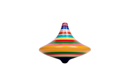 A spinning top toy with bands of color including yellow red green and black is visible in the center of the frame on white and transparent
