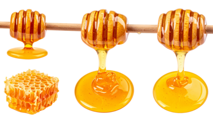 Close-up of honey and dippers dripping golden syrup; honeycomb at the bottom left