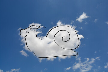 Creative cloud art features a white fluffy cloud shaped like a snail with a black outline against a bright blue sky © nahhan