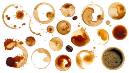 Isolated coffee stains and splashes against black background, various shapes and sizes