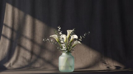 Calla lilies eucalyptus arrangement frosted vase shadow play