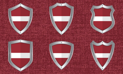 Set of metal shields with the Latvian flag