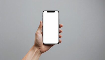 Minimal mobile phone with blank screen in human hand showcasing modern communication technology and app promotion use