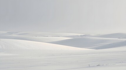Obraz premium Snowy landscape viewed from a distance with hills and people walking