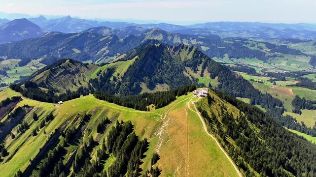 Aerial summer view of the Kronberg with cable car and panoramic alpine landscape