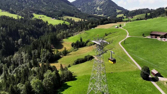 Aerial summer view of the Kronberg with cable car and panoramic alpine landscape