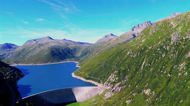 Aerial summer view of the Lukmanier Pass with the reservoir and clear blue sky