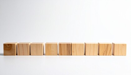 Nine wooden cubes aligned in straight horizontal line, minimalist symmetry and clean orderly composition.