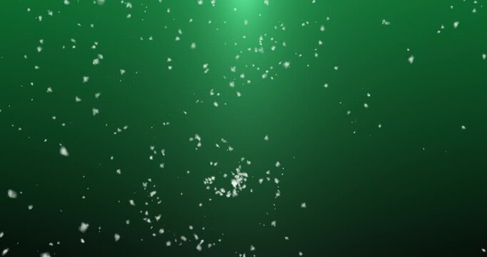 An abstract snow round dance hovers in a dark blue abyss, weaving patterns of light particles. The cold beauty of winter comes to life in the dance of weightless snowflakes.