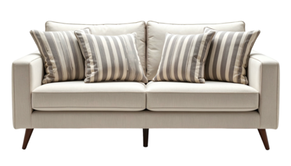 Beige loveseat with striped pillows against a black background, inviting and cozy