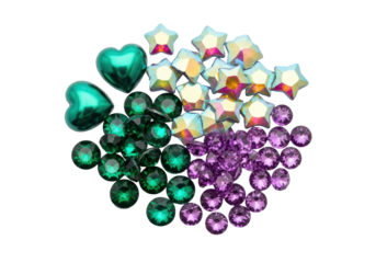ultra-detailed macro flat lay of iridescent rhinestones, emerald heart cabochons, and amethyst gems scattered on a transparent background. luxury crafting supplies concept