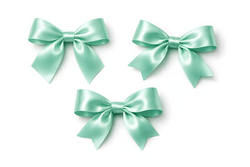 Elegant Ribbons: A trio of graceful, pastel-green ribbons, each meticulously tied into perfect bows, casting soft shadows, ideal for any festive event or decorative project.