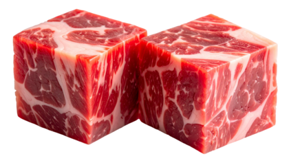 Two red raw meat cubes with intricate marbled fat patterns, on black