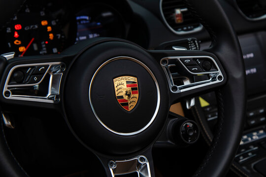 December 23, 2020, Seoul, South Korea - The steering wheel and logo of a Porsche 718 Boxster GTS sports car.