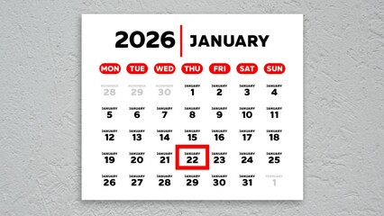 The date January 22nd marked with a red cursor on the wall calendar 2026