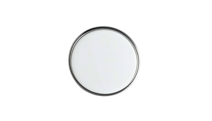 Overhead view of a circular, metallic-rimmed object, with a flat white center against black