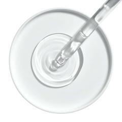 Clear liquid from dropper pours into a transparent petri dish, top-down view