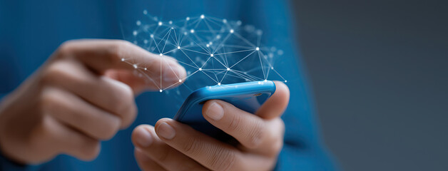 Hand operates smartphone while glowing network mesh appears above, illustrating digital connectivity.