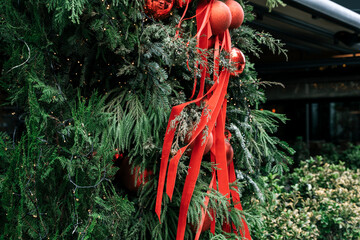 Festive Christmas Tree Decorated with Red Baubles and Ribbons