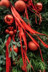 Festive Christmas Tree Decorated with Red Baubles and Ribbons