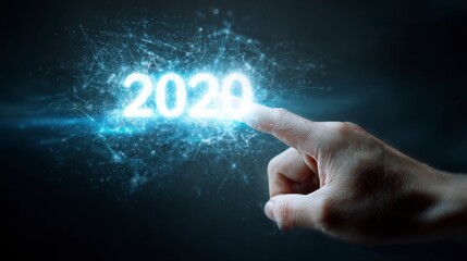 A hand touching an illuminating digital 2020 figure, emerging from a network of lines and dots, creating a technological concept