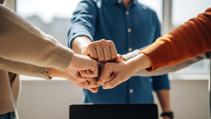 Teamwork and unity fist bump close up success collaboration