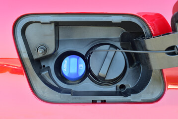 Plastic AdBlue tank cover on a passenger car