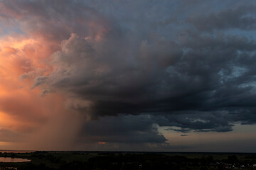 Fototapeta premium Beautiful sunset over Lake Dąbie in Szczecin. View from a drone.