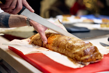 cutting meat on the grill
