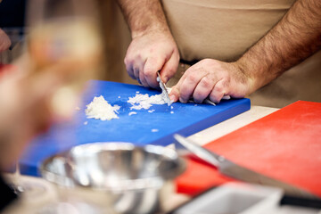 young man holding a credit card