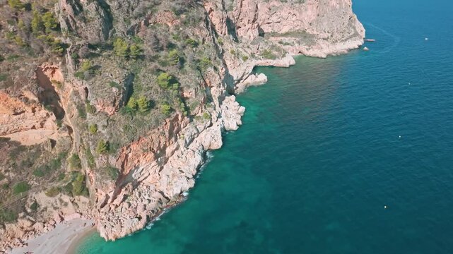 Aerial view of Cala del Moraig beach and cliffs, Costa Blanca, Spain.