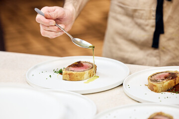 young man holding a cup of coffee