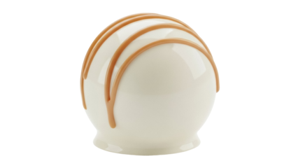 Isolated gourmet white chocolate bonbon with caramel drizzle on top, round dessert ball