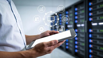 AI workflow automation concept - A person holding a tablet stands amidst blurred server lights and workflow icons, illustrating a modern corporate environment focused on technology and productivity.