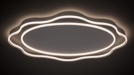 An oval lighting fixture emits soft white illumination with two concentric rings creating layered design against a dark 