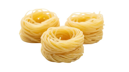 Isolated nests of uncooked dried angel hair pasta rings for Italian food cuisine dishes