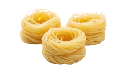 Isolated nests of uncooked dried angel hair pasta rings for Italian food cuisine dishes
