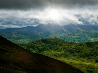 View of mountains and clouds over the Coomloughra Horseshoe hiking trail.