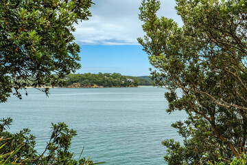 Taken at Hungry Point Reserve on the Cliff Top Walk in December 2025, this photo shows the coastline views toward Bundeena and Maianbar, with people enjoying hiking and coastal life.