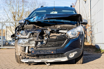 wrecked car with front damage