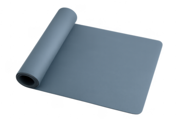 Grey yoga mat unrolling for fitness exercise