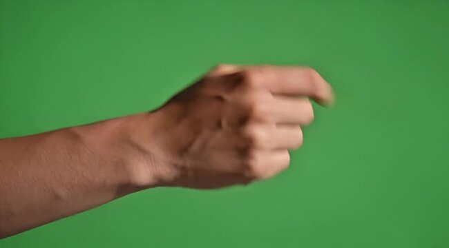 Close-up of Human Hand Making a Beckoning or Summoning Gesture Against a Green Screen Background