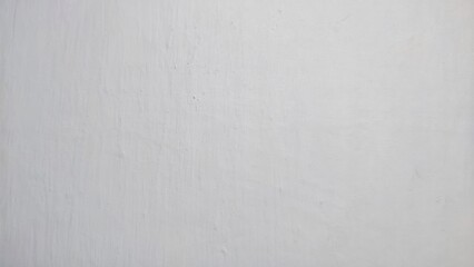 White painted wall texture with subtle vertical brush strokes and minimalist industrial plaster finish.
