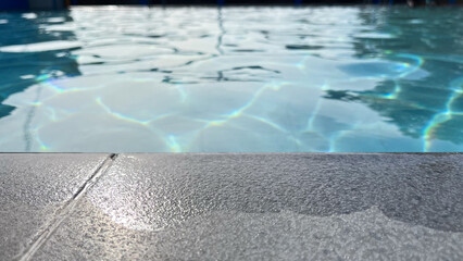 Poolside Edge Detail with Calm Water