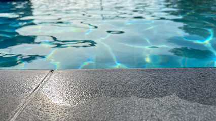 Poolside Edge Detail with Calm Water