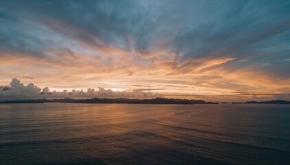Fototapeta premium Sunset sky with vibrant colors in Langkawi, suitable as a nature-themed backdrop, World Environment Day