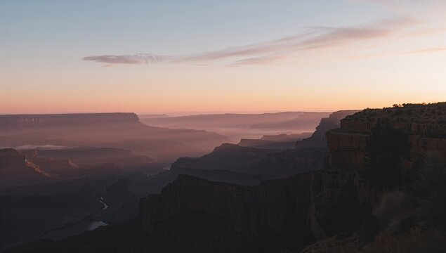 Lower canyon landscape at sunset with rolling hills, suitable for background use in visual design