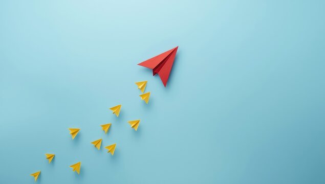 Red origami paper plane leading smaller yellow planes on blue background emphasizing leadership and guidance, World Creativity and Innovation Day - Powered by Adobe