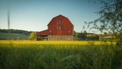 Obraz premium Red Barn with restored wooden structure, serving as a seasonal farm attraction, highlighting preservation efforts