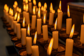 Candlelight ambiance fills the space with warmth and serenity during an evening prayer service